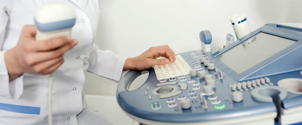 Diagnostic Medical Sonographer preparing to perform an ultrasound. Concept to highlight the role of a sonographer.